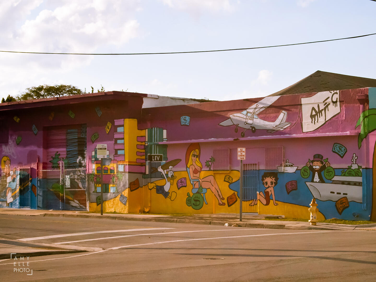 Mural art by artist Alec Monopoly at Wynwood, Miami, Florida