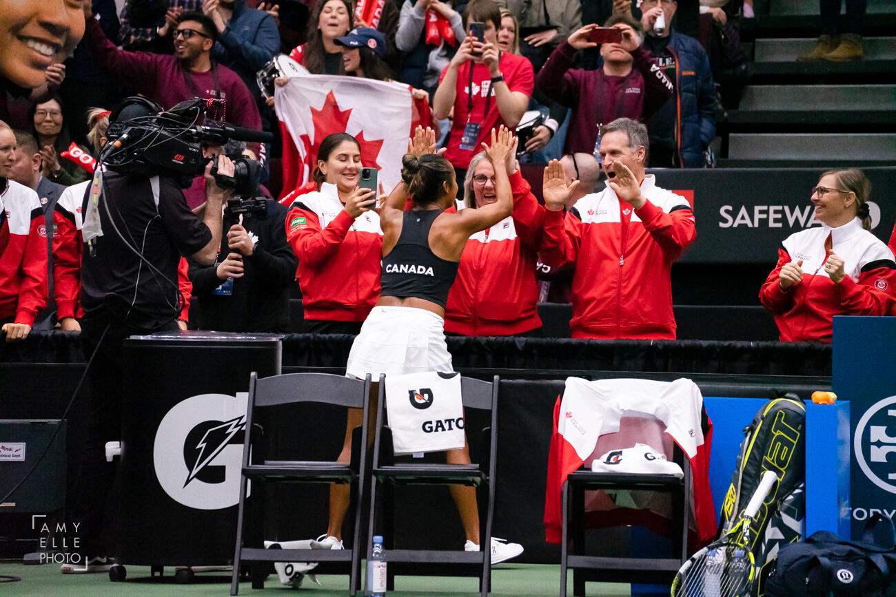 Bianca Andreescu and Team Canada celebrates with Leylah Annie Fernandez after she wins her match at the 2023 Billie Jean King Cup first round qualifiers